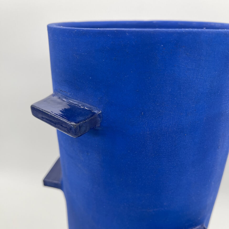 Blue Cylinder Vessel with Wings
