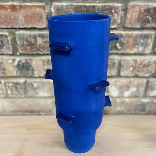 Blue Cylinder Vessel with Wings