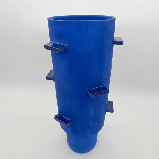 Blue Cylinder Vessel with Wings